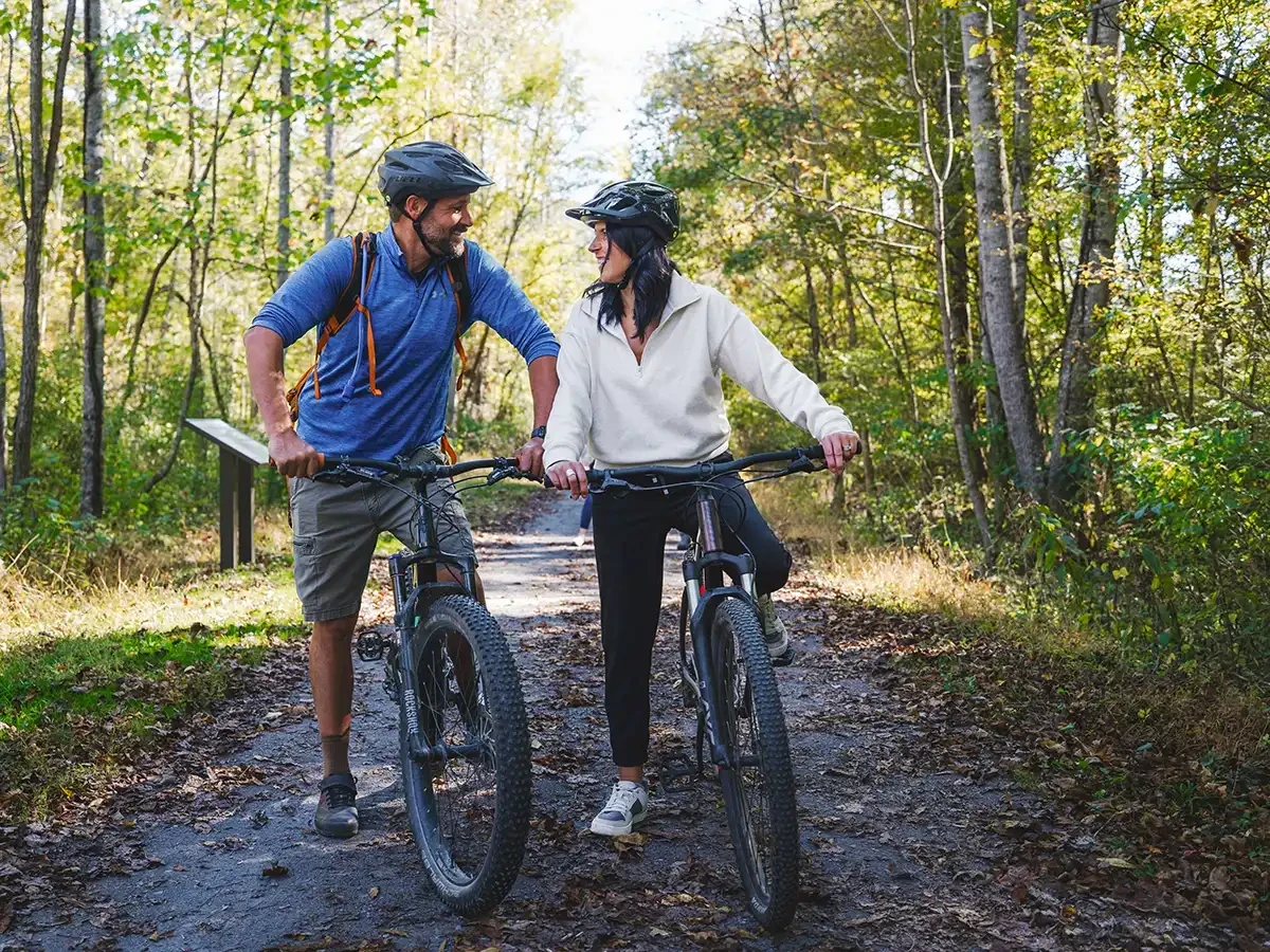 couple biking on the greenbrier river trail