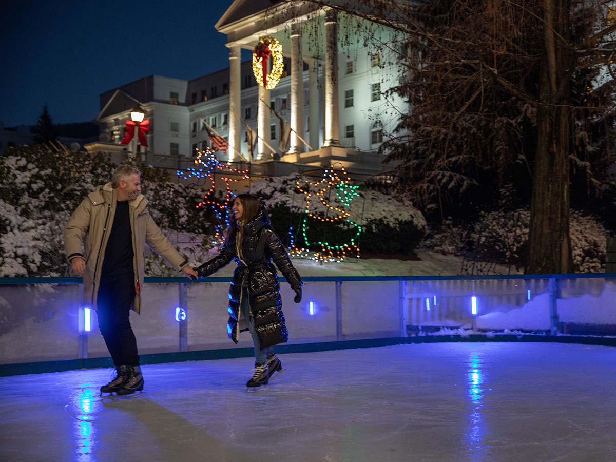 couple ice skating at the greenbfier