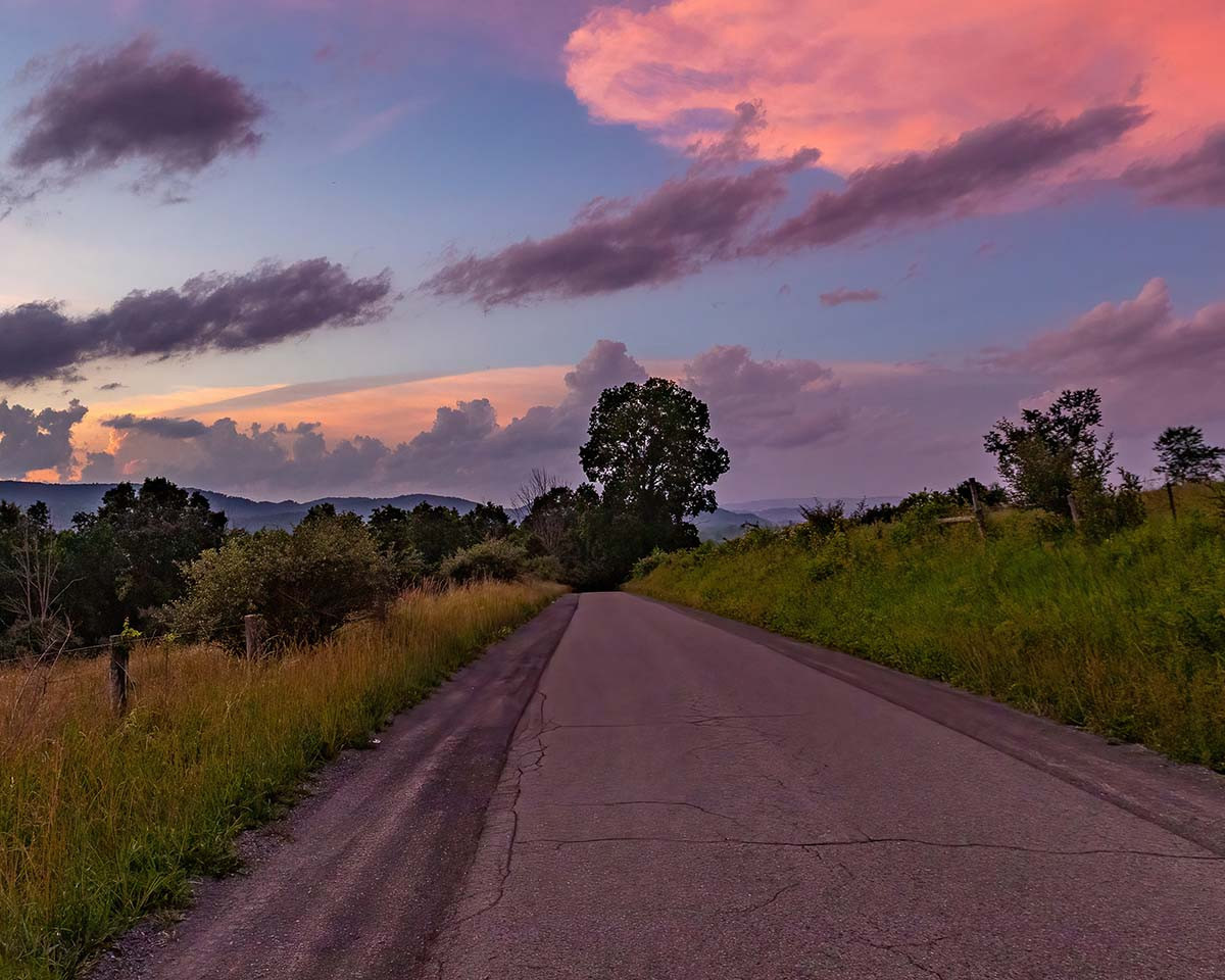 country road at sunset near blue sulphur springs wv